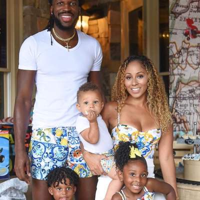 Lesha Carroll with her husband and children